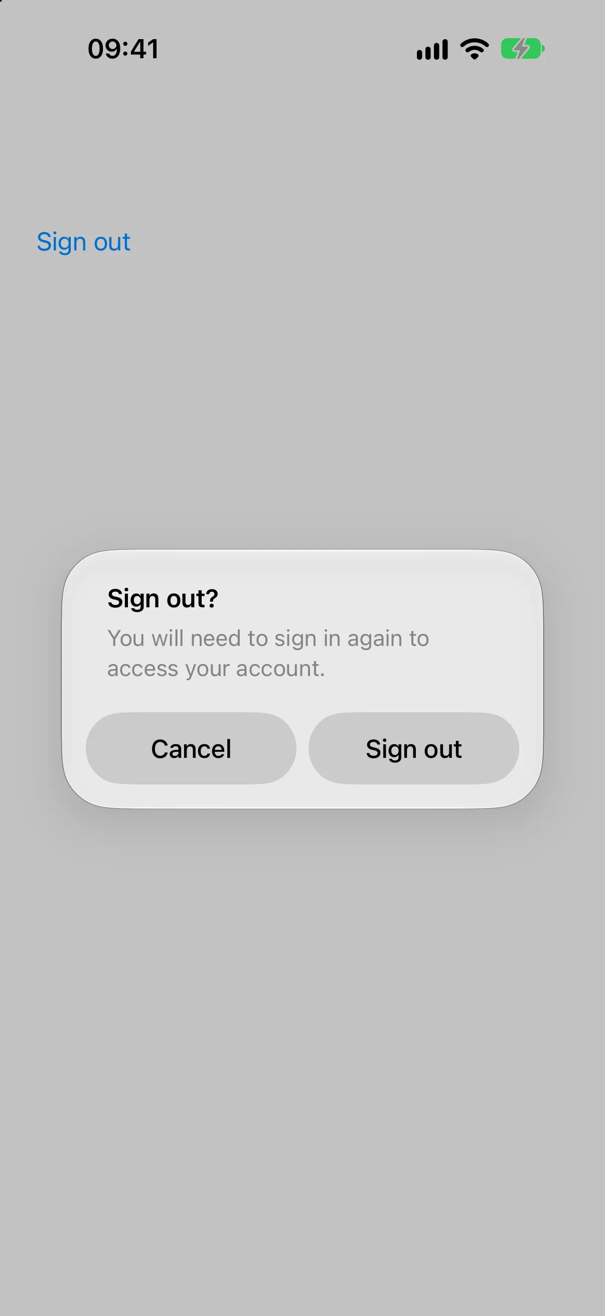 标题为 Sign out？包含消息以及 Cancel 和 Sign out 按钮的 Alert