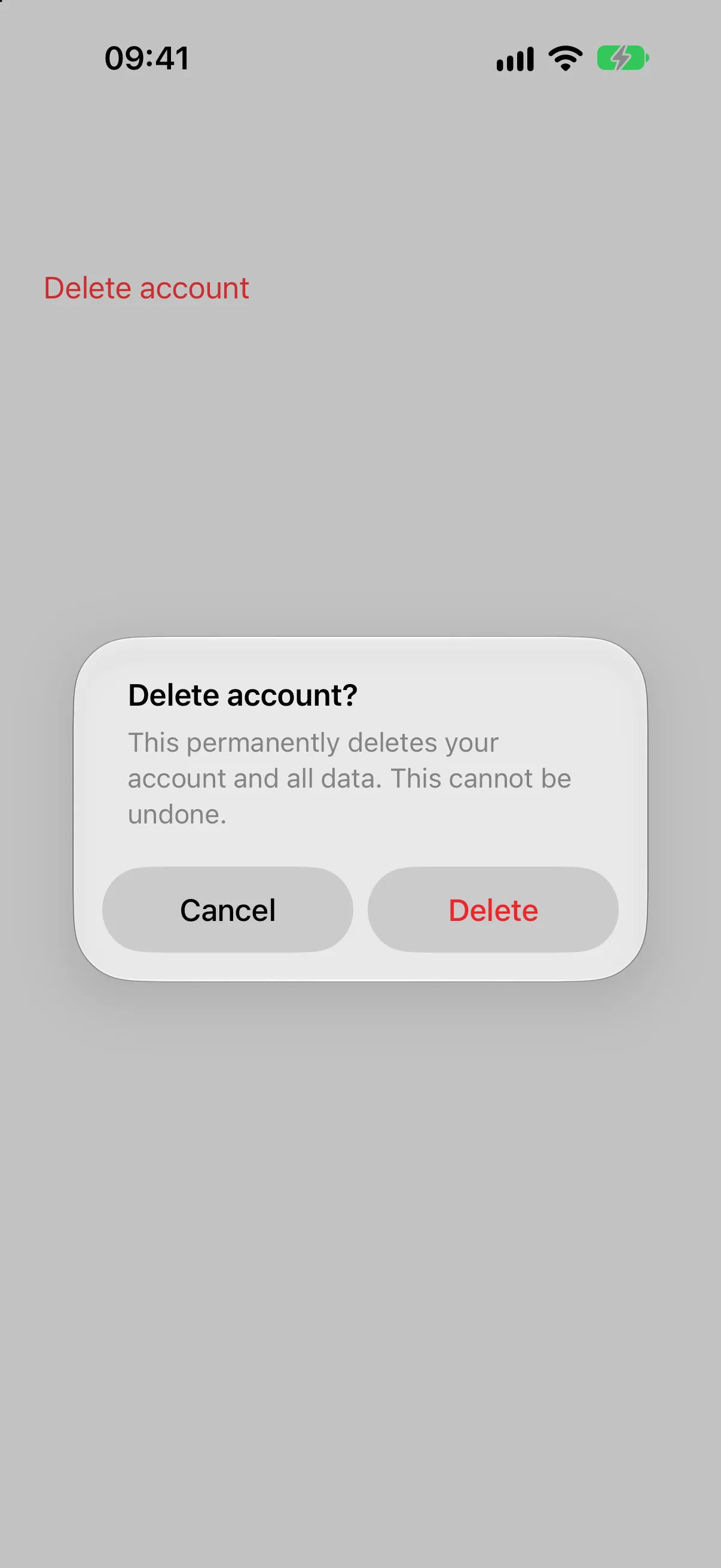 标题为 Delete account？包含消息、Cancel 按钮和红色 Delete 按钮的 Alert