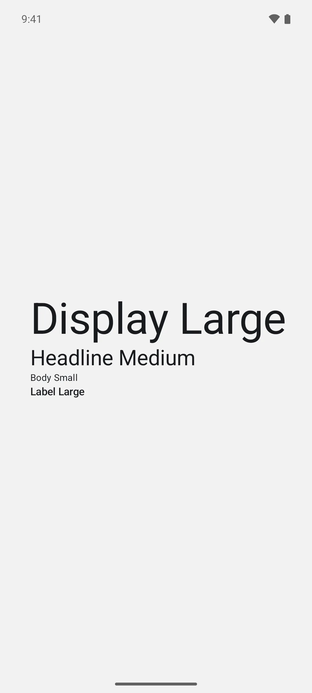 四行文字，分别展示 display large、headline medium、body small 和 label large 字号