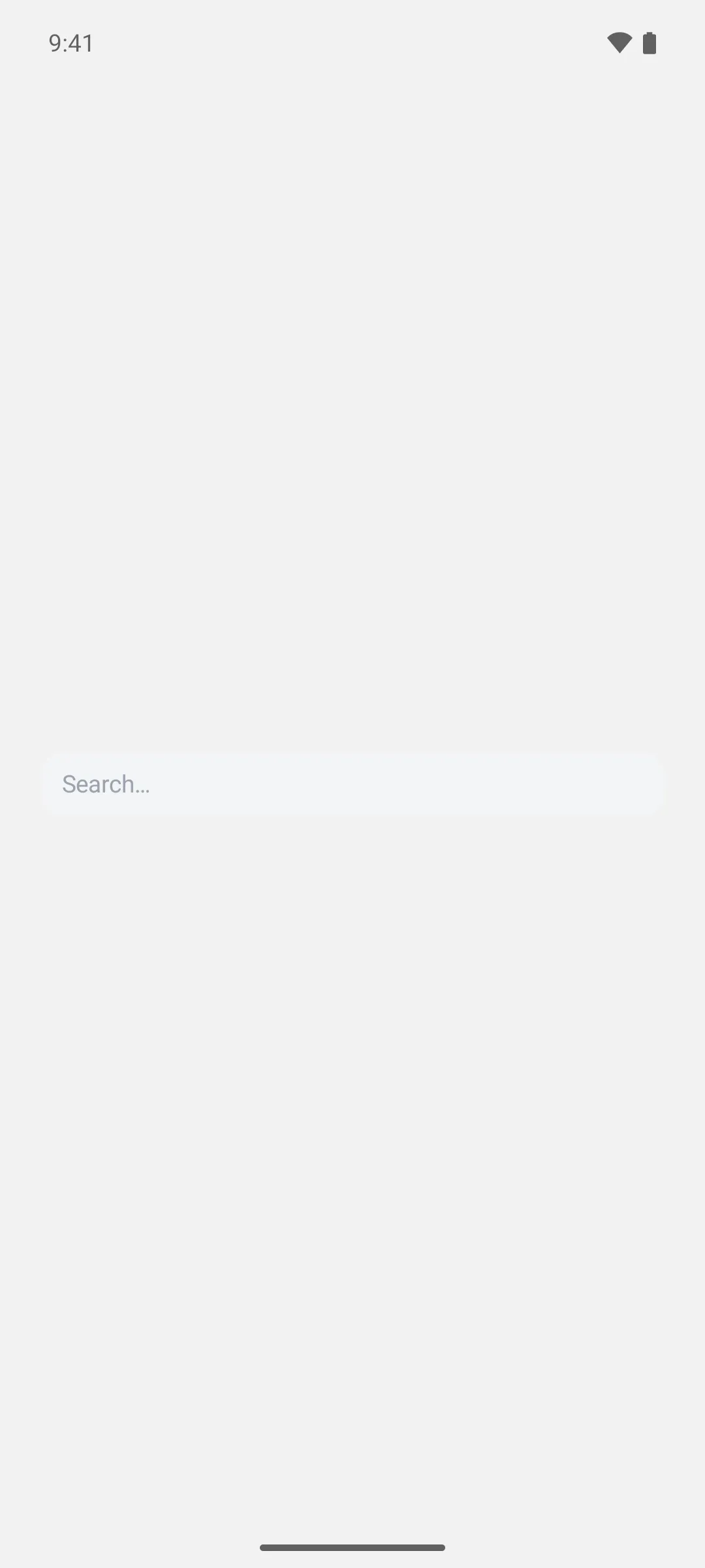 一个未加样式的文本字段，呈现为全宽圆角灰色药丸形状，并显示 Search 占位符
